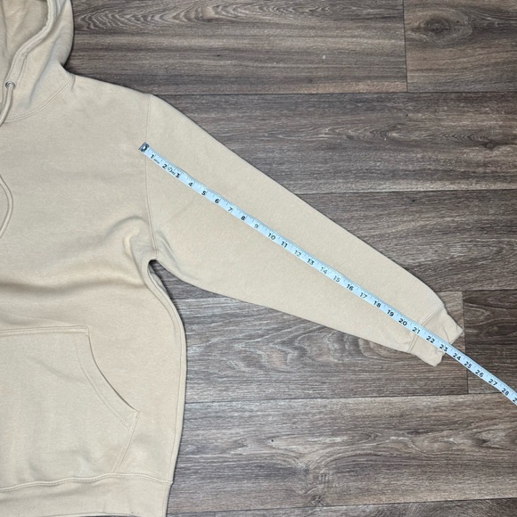 Tan Sweatshirt with 'Love Never Fails' Design Size Medium - Picture 9 of 10